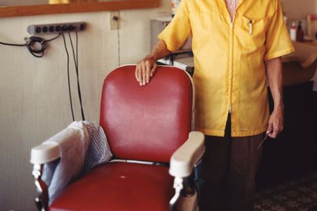"I really needed a haircut, so i stepped into Benny White's Arco Barber Shop. I sat down in that old, red chair and received one of the most attentive and quality haircuts of my life. Afterward I thanked White and asked him if he wouldn't mind me taking his portrait."