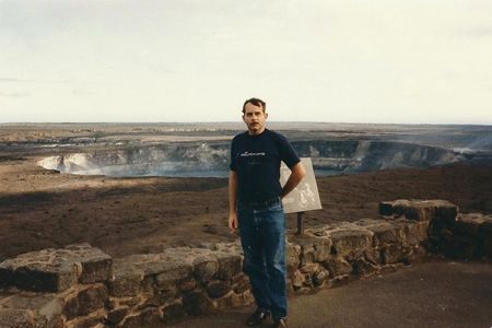 Dr. B. Ray Hawke on the rim of Kilauea Caldera, Hawaii Volcanoes National Park, 1984.