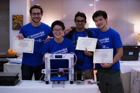 Cormac Hondros-McCarthy, Lauren Shum, Parth Sagdeo and Ted Zhu celebrate their successful top prize spot at the Make for the Planet Borneo hackathon in Kuching, Malaysia in June 2018.