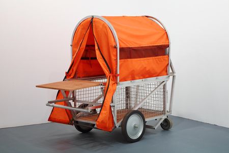 Homeless Vehicle, Variant 5 by Krzysztof Wodiczko, c. 1988, aluminum, fabric, wire cage and hardware