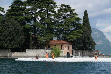 Workers start to encircle the island of San Paolo with the first floating elements, April 2016.