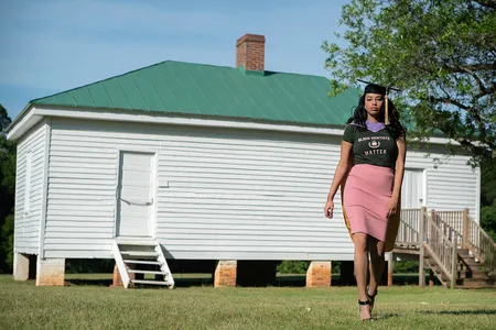 To mark her graduation from dental school in 2021, Breanna Henley took photographs in front of a slave cabin at Redcliffe Plantation.