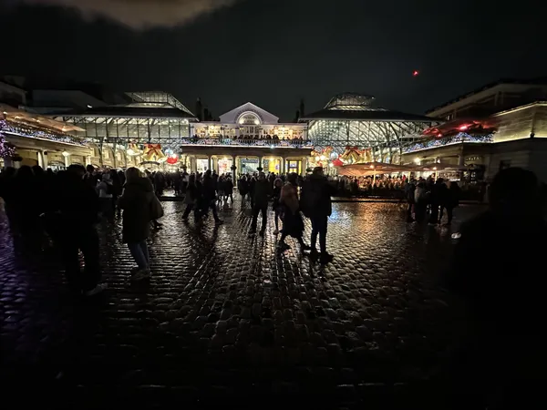 Christmas shoppers at Covent Garden London thumbnail