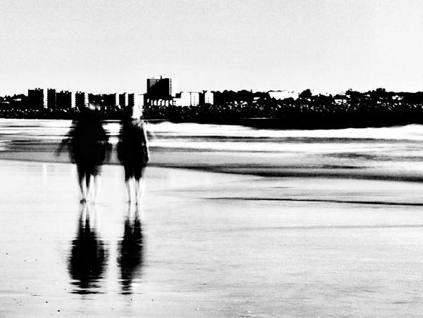 Silhouettes on the Beach in Black and White thumbnail