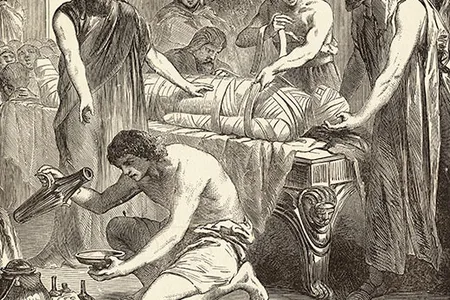 Egyptians embalming a corpse.