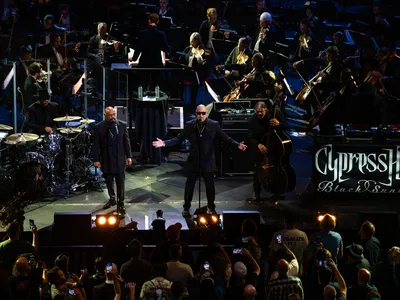 Cypress Hill&#39;s&nbsp;Sen Dog and B-Real&nbsp;perform with the London Symphony Orchestra at the Royal Albert Hall in London.