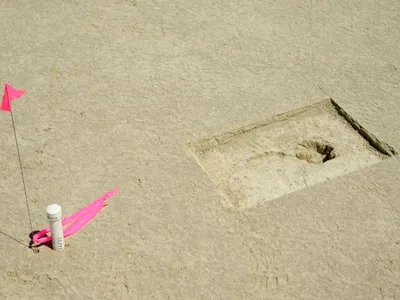 A footprint discovered on an archaeological site is marked with a pin flag on the Utah Test and Training Range, July 18, 2022.