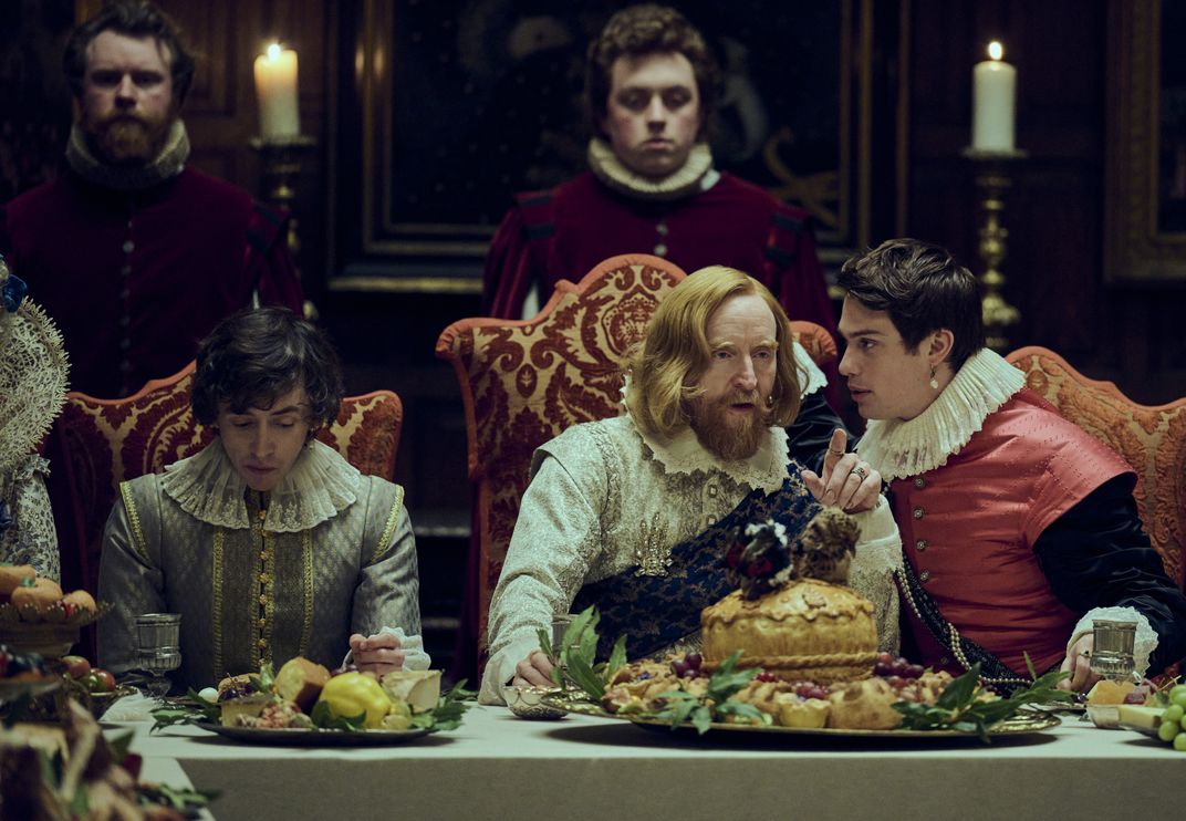 Tony Curran (center) as James I and Nicholas Galitzine (right) as George Villiers