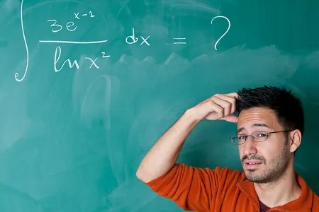 A student tries to solve a math problem.
