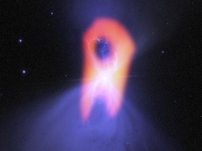 Both the Hubble Space Telescope (blue) and the ALMA Observatory contribute to this image of the Boomerang Nebula