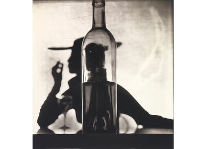 Girl Behind Bottle (Jean Patchett) by Irving Penn, New York, 1949, printed 1978