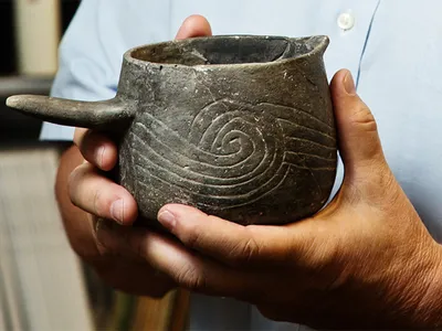 Pottery beakers were used to hold the “Black Drink”.