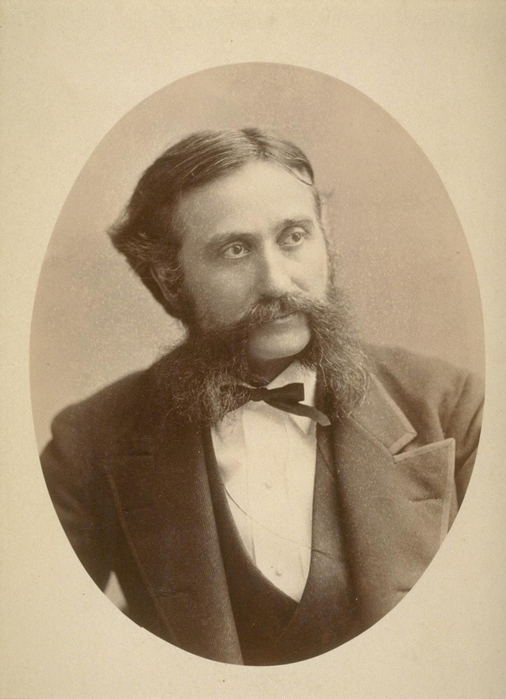 Sepia-toned photograph of man.