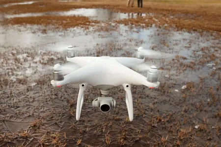 David Givens and Bob Chartrand, archeologists studying Smith's Field in Jamestown, Virginia, use this DJI Phantom 4 to get high-resolution images of the site.