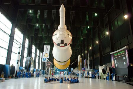 Beneath the giant Saturn V rocket (an authentic dynamic test vehicle) at the U.S. Space & Rocket Center in Huntsville, Alabama, astronauts-to-be hear stories of pioneering rocketeers.