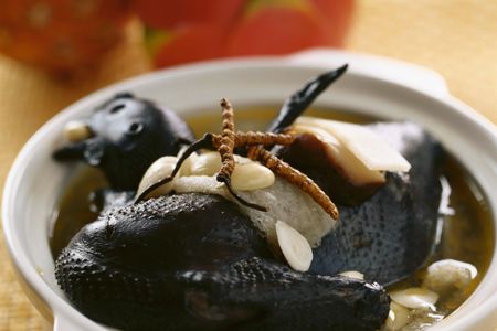 Black chicken served with bamboo shoots and caterpillar fungus
