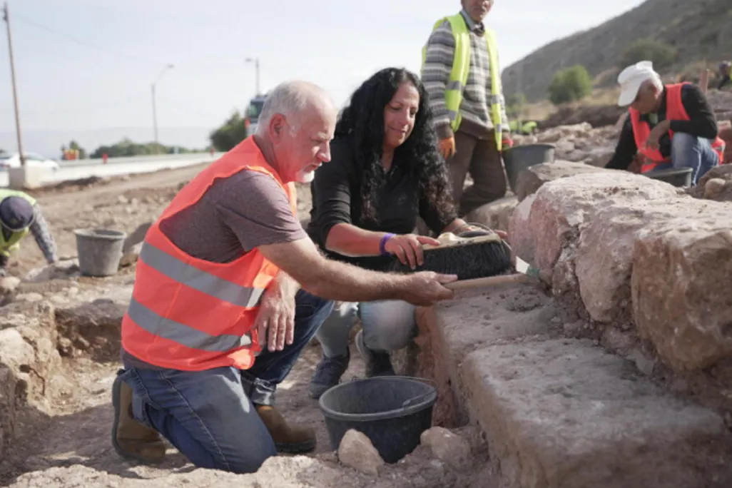 Archaeologists at excavation site