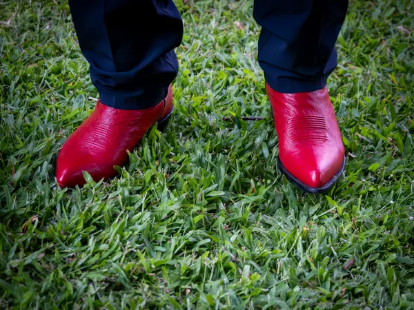 Red cowboy boots in Hawaii thumbnail