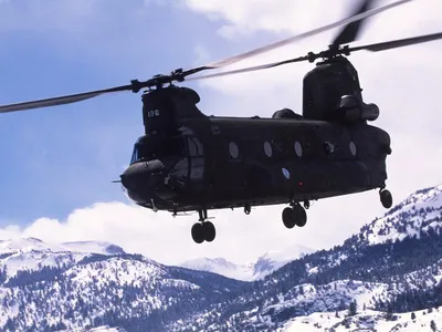 The Chinook's cargo capacity, speed, and high-altitude performance make it the ideal support aircraft for Special Operations teams in Afghanistan. Here, a CH-47D Chinook flies over the Marine Corps Mountain Warfare Training Center near Bridgeport, California.