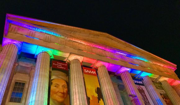 SAAM lit for Pride 2018. Photo by Andrew Rondinone. The museum exterior will be lit again for Pride 2019 from May 31 through June 9.