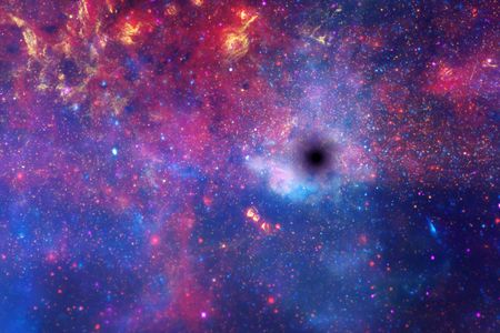 One of the best views of the galactic center combines images from the Hubble, Spitzer, and Chandra space telescopes. An artist's concept depicts the likely black hole within. 