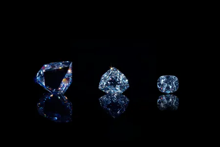 For the first time, scientists have created near-perfect cubic zirconia replicas of the diamond in its previous forms. From left to right: the original brought from India, King Louis XIV’s “French Blue” and the Hope Diamond. 