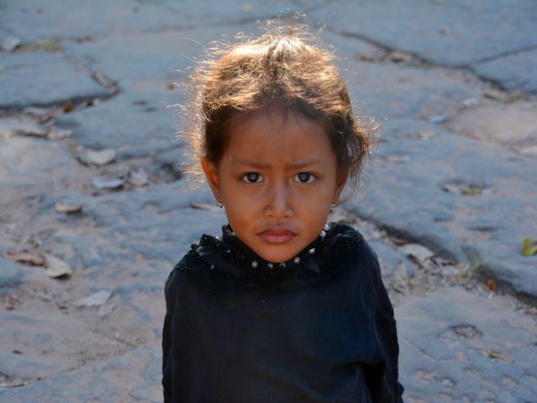 Young girl outside Angkor Wat thumbnail