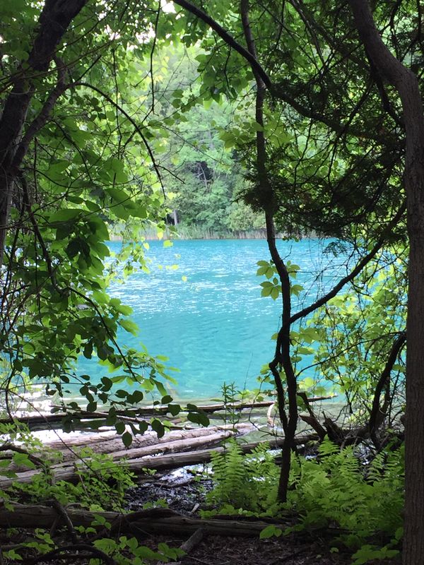 A body of blue green oasis while hiking Green Lakes State Park. thumbnail