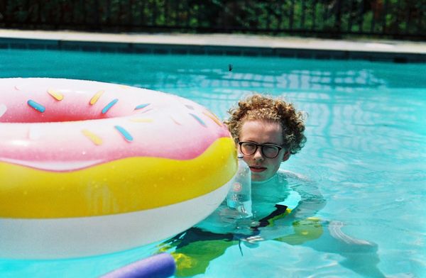 Ben with inflatable pool donut thumbnail