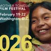 The face of a smiling young woman with face paint wearing beaded earrings against a colorful backdrop. Text: Mother Tongue Film Festival. February 19 to 22, Washington, D.C. 2026.