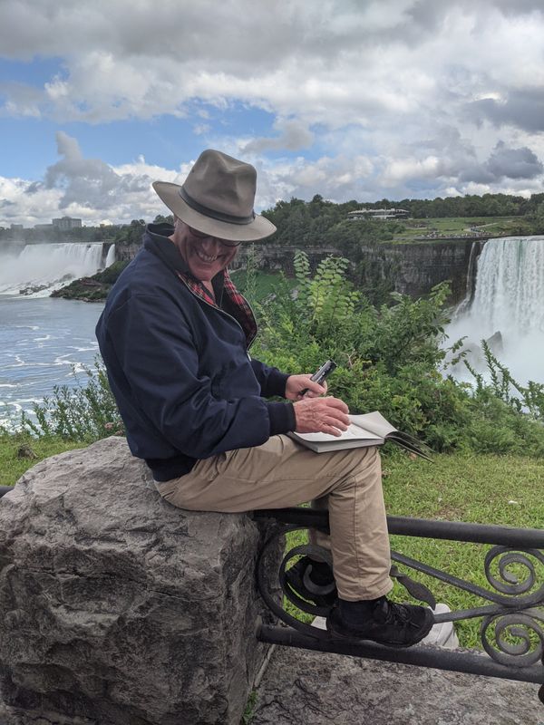 An artist sketching away at Niagara Falls, Ontario Canada thumbnail