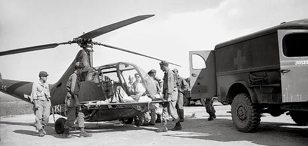 For the wounded on Luzon in 1945, the Sikorsky R-6A transport doubled as an ambulance.