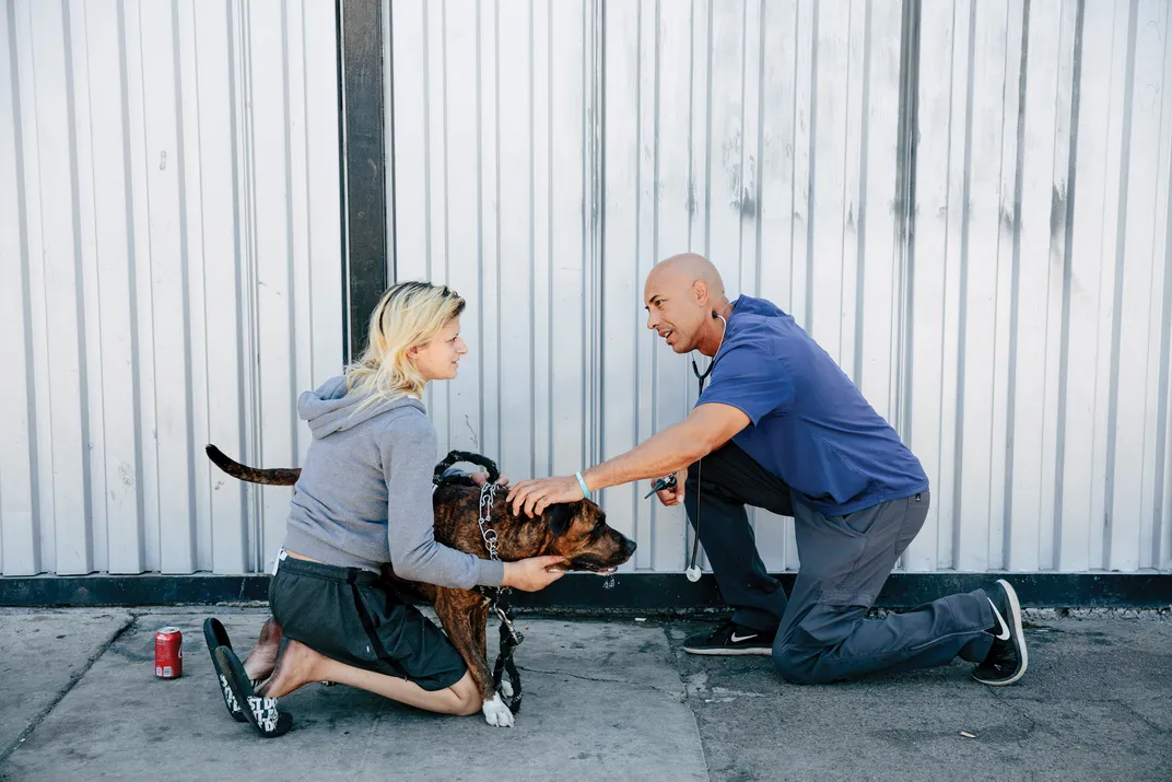 A woman and her dog.