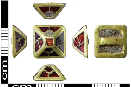 The gold and garnet pyramid mount found in Norfolk, England