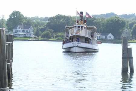 The Sabino sailing into port in 2005. The steamboat still carries museum-goers on tours of the Mystic River.