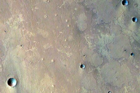 Mars’ Chryse Planitia region is peppered with small hills topped with craters that might be mud volcanoes. 