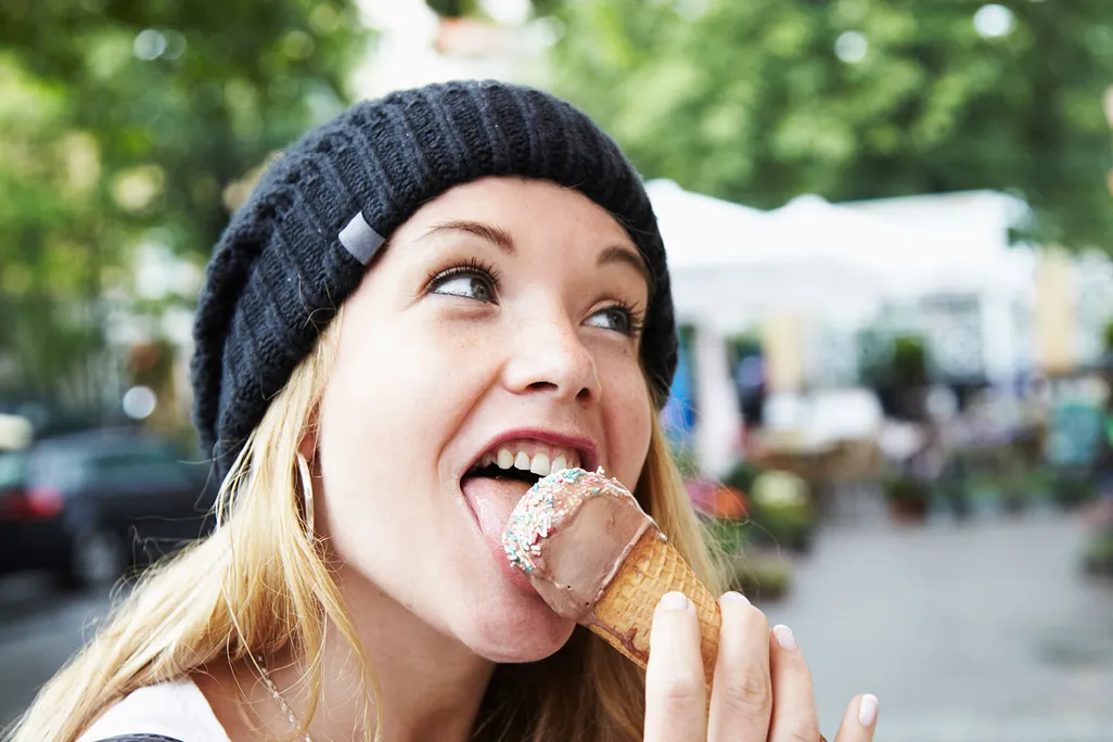 Woman Eating Ice Cream Cone