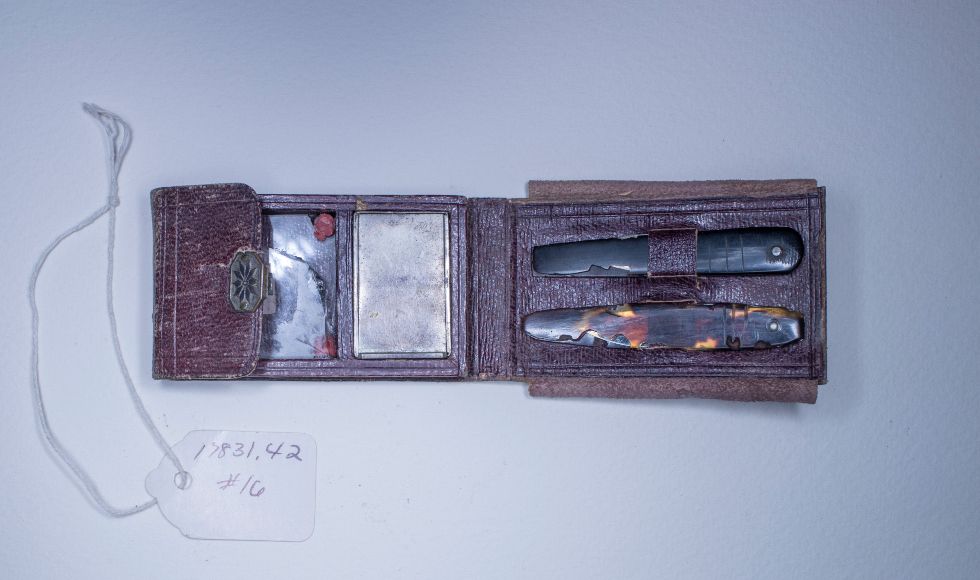 A small leather vaccination kit, with small lancets and glass slides used for inoculating soldiers against smallpox during the Civil War