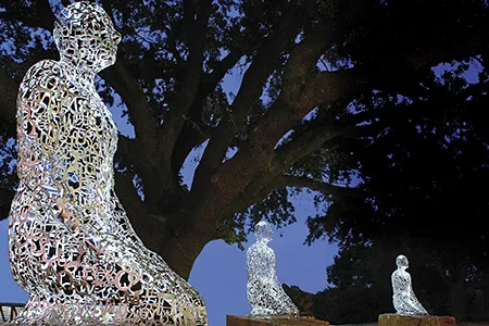 In Houston’s Buffalo Bayou Park, Tolerance is seven figures—one for each continent—sculpted of letters from world alphabets.