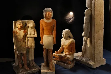 Ancient Egyptian statues and art depict scribes holding cross-legged or kneeling positions while working.