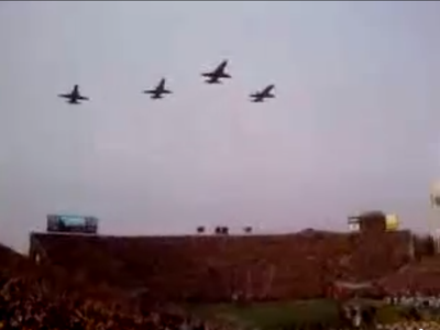 Iowa Hawkeye fly over football game