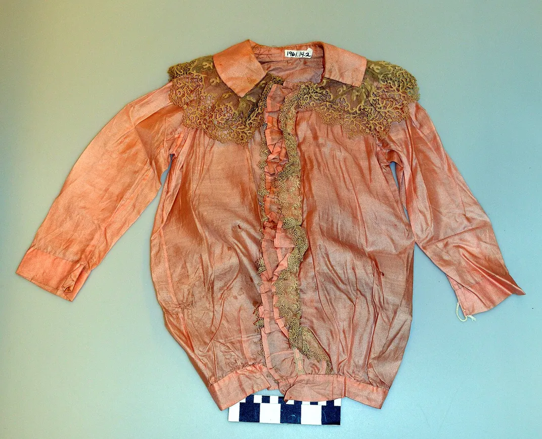 A boy's pink silk shirt, circa 1890