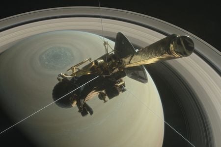 An artist's rendering imagines what Cassini must have looked like as it headed on the first of a series of orbits between Saturn and its rings. 