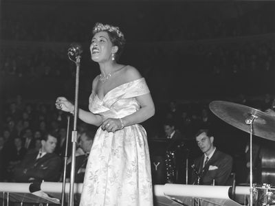 Billie Holiday, performs on stage, 14 February 1954.