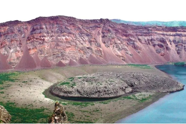landscape scene with a ridge showing red, white and black layers