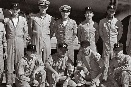 The Pollysboy 11 crew: Author Paul F. Stiller, standing, third from left; Bruce McCormick to his left; George Fabik, far right; Eric Neptune, front row, far right.