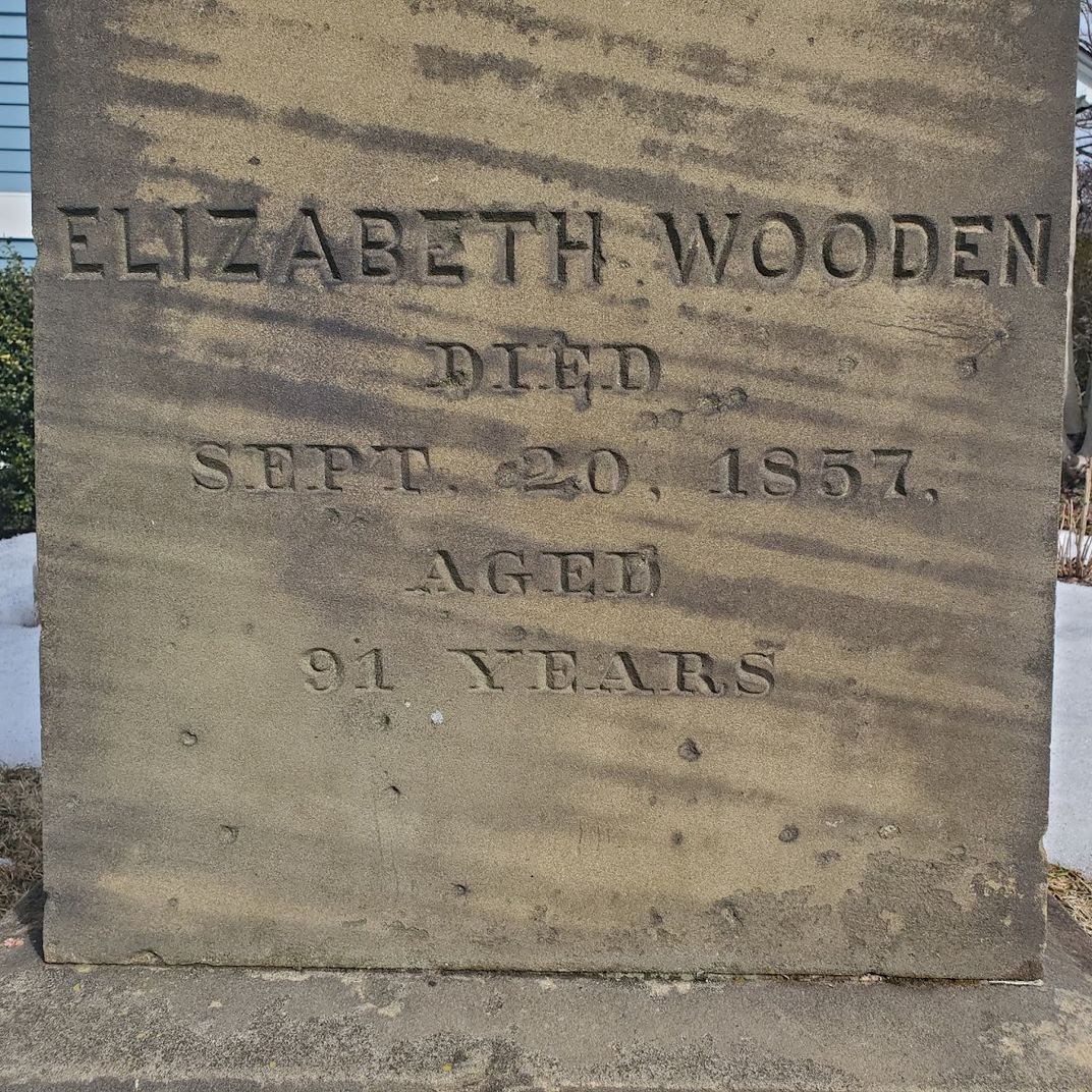 The gravestone of Elizabeth Wooden, who brought food to Maltbie when he was imprisoned on espionage charges