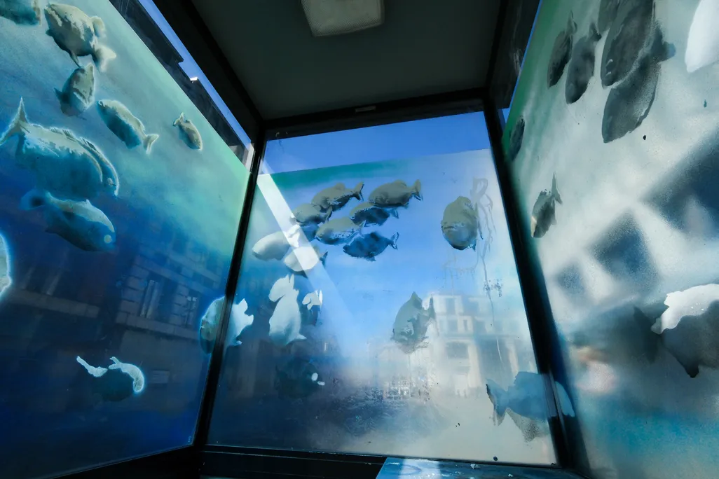 Banksy's Piranha in the City of London in a police sentry box near St Paul's Cathedral.
