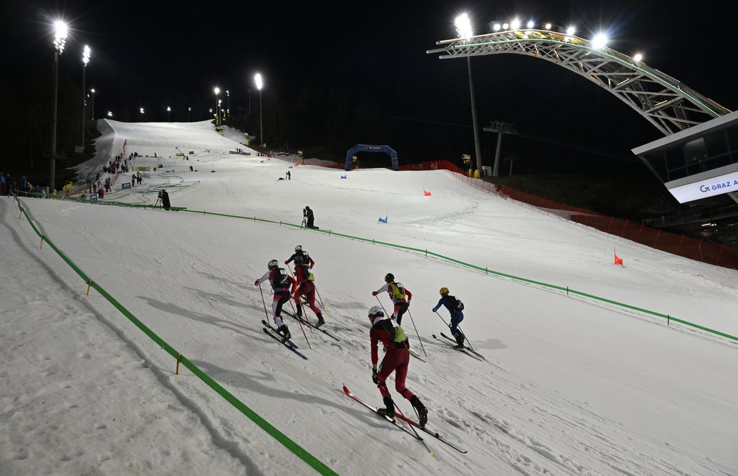 running up slope in skimo race