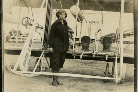 Ruth Law stands in front of her Wright Model B biplane at the New York State Fair, Yonkers, 1913.
